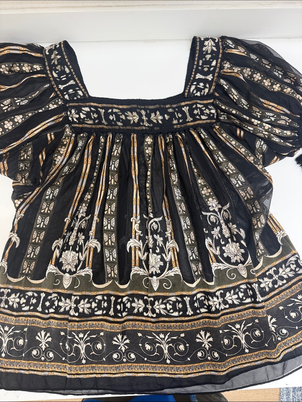 Eci Women’s Black Floral Peasant Top with Gold Accents